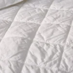 pdp diamondstitch comforter alpinewhite a sp21 detail 33300 2 23e5bd88 eff8 4311 9f8b 8e828f25b735.webp