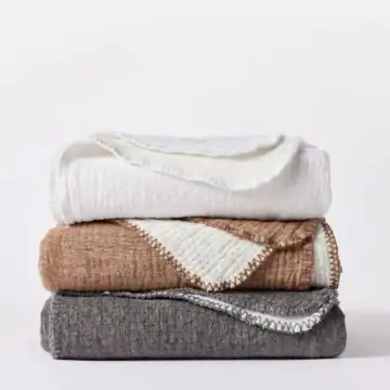 pdp cozy cotton throw stack multicolor sp23 09267 2ae16881 b3fb 4bec b12b 75bc17ad19a0.webp